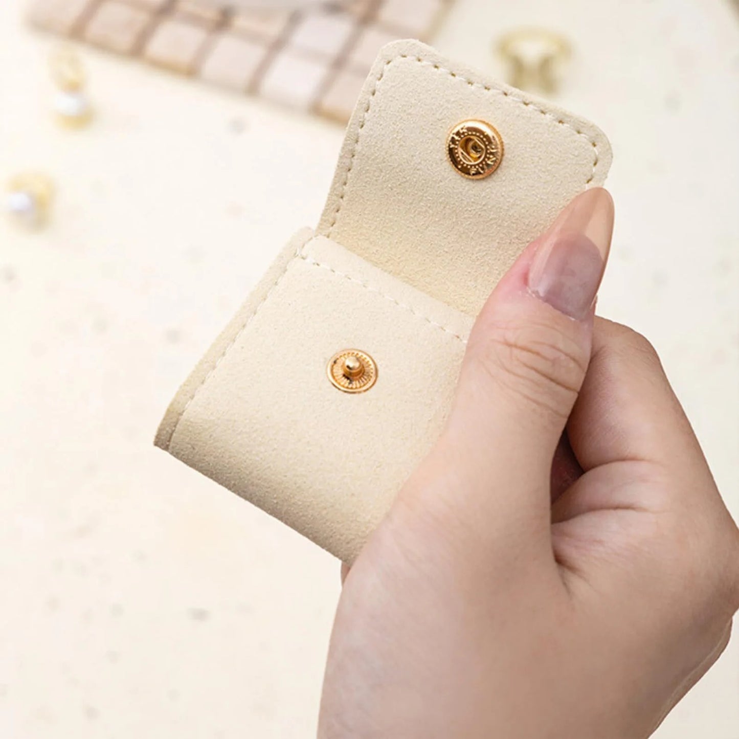 Mini étui à bijoux de voyage en cuir traité