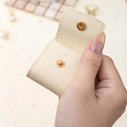Mini étui à bijoux de voyage en cuir traité